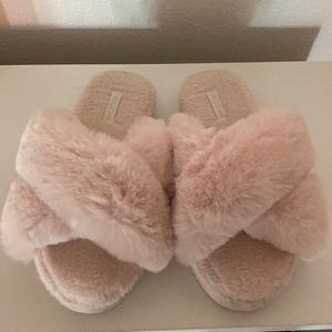 Furry pink slippers